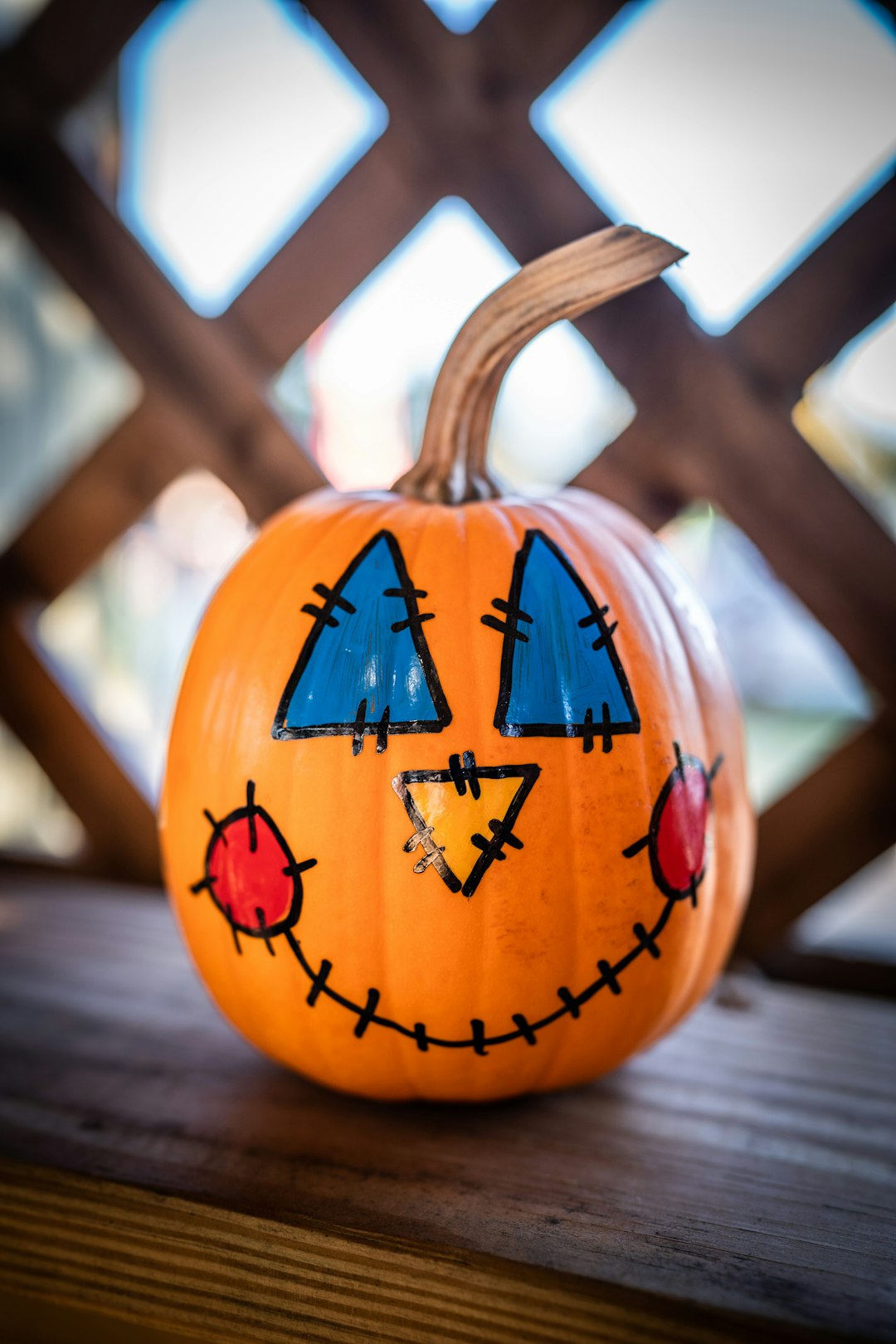 Photo by Brian Wegman 🎃 a carved pumpkin with a face